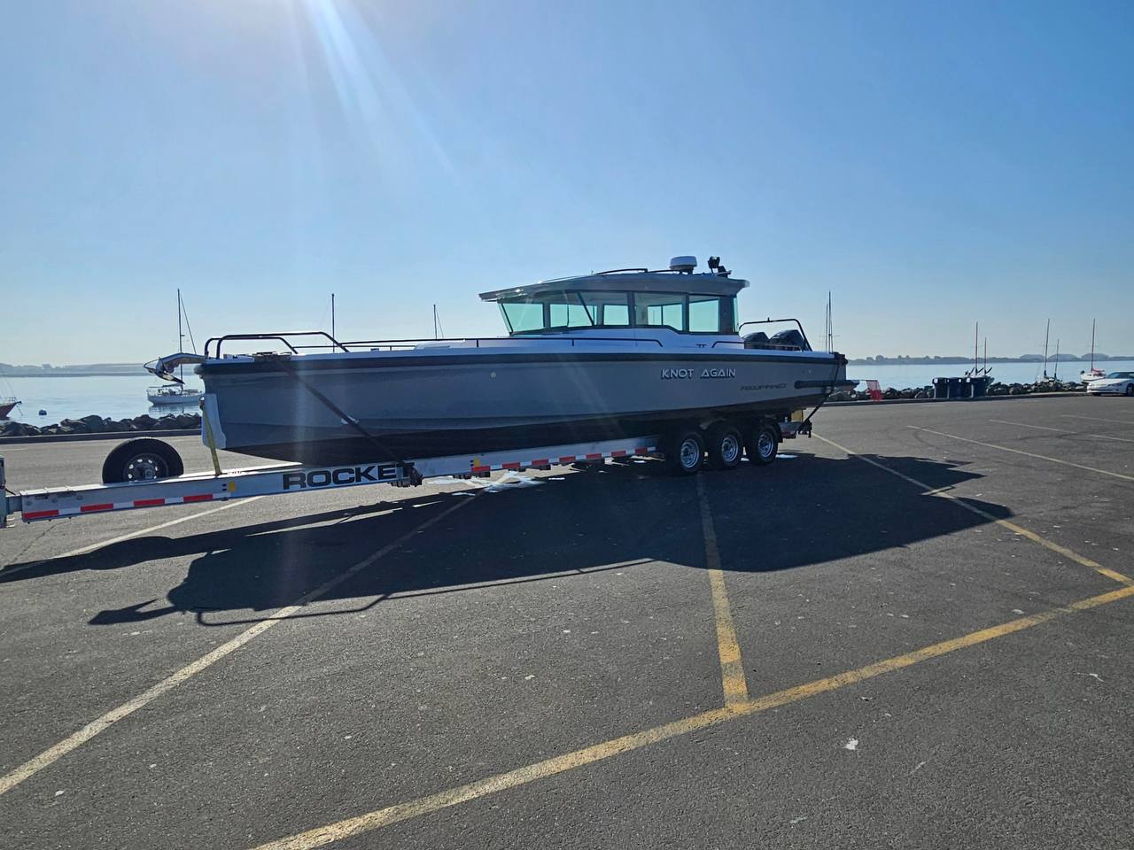 Boat service crew hauling a vessel